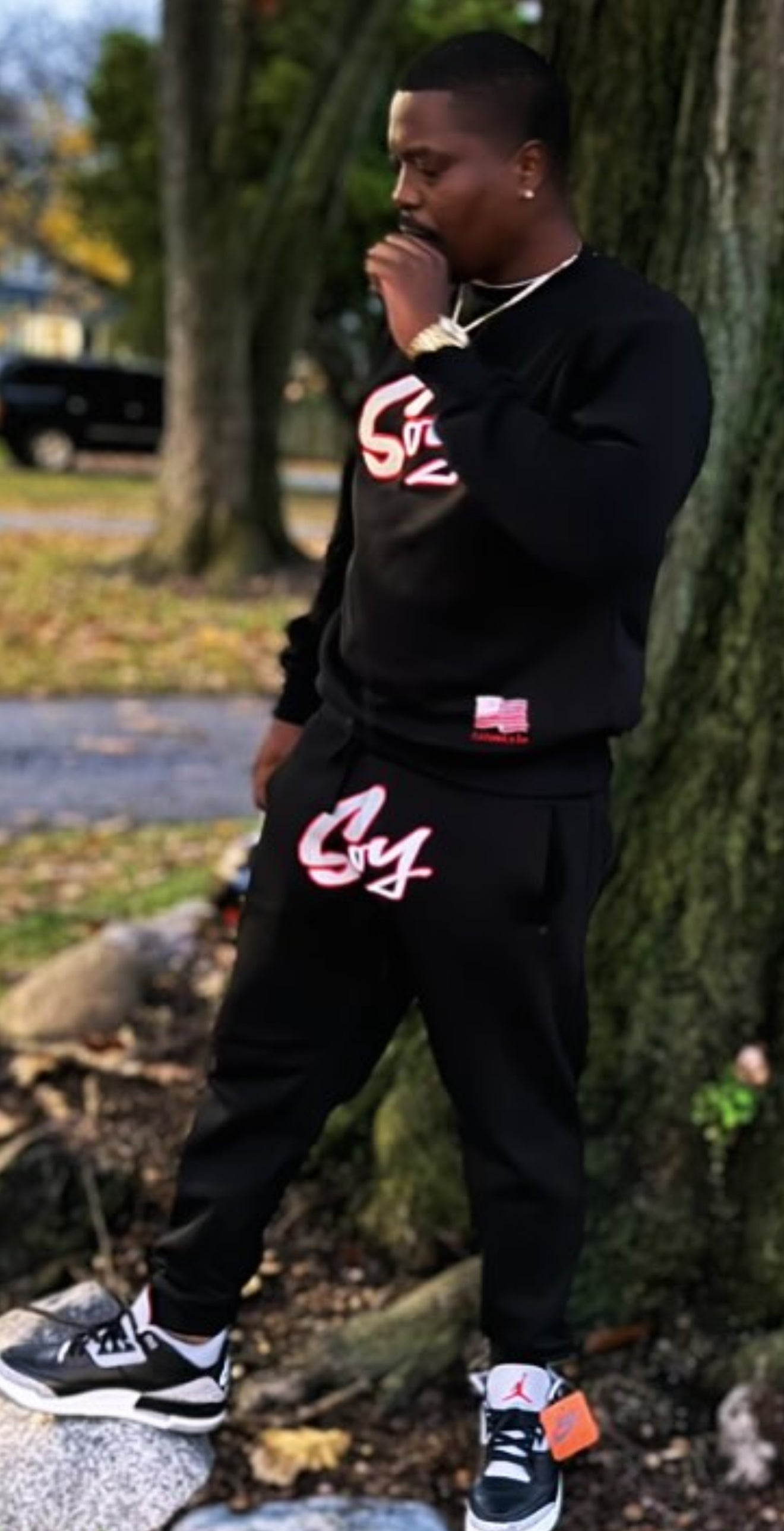 Black jogging set with white and red trim