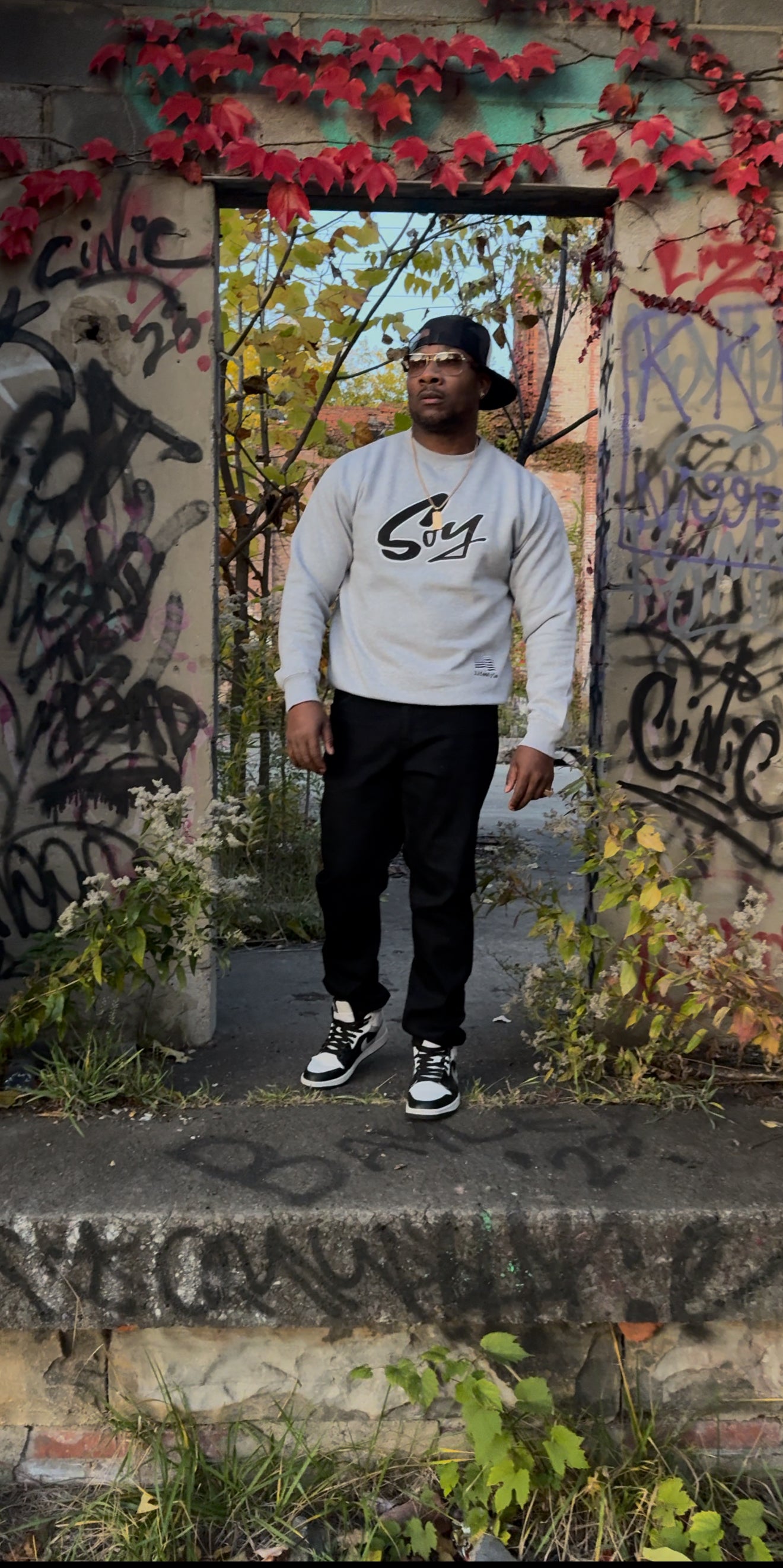 Gray and black with white trim soy sweater